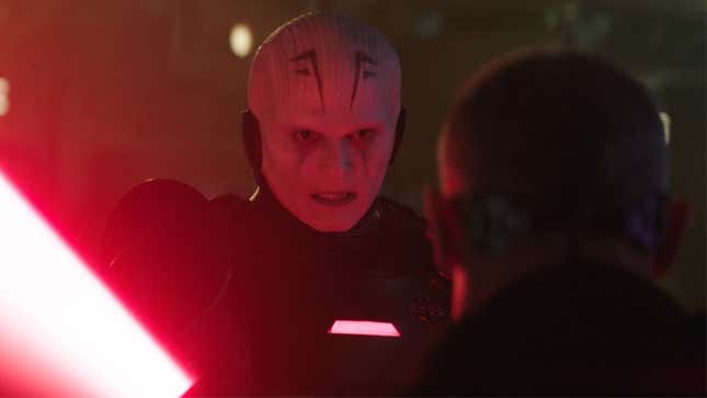 Rupert Friend as the Grand Inquisitor in Obi-Wan Kenobi, threatening someone with his red lightsaber.