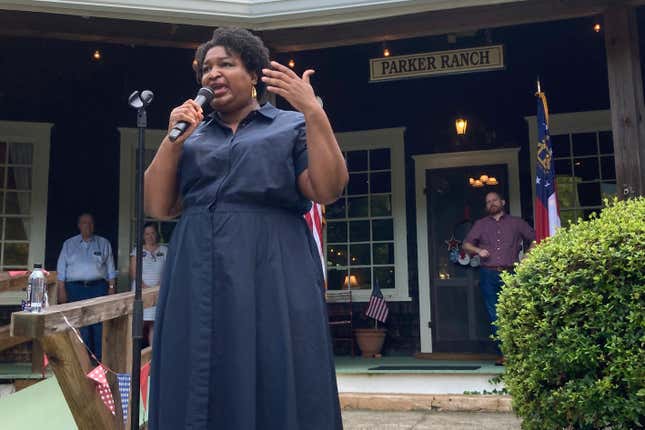 Georgia Democratic candidate for governor Stacey Abrams speaks on July 28, 2022, during a rally in Clayton, Ga. Abrams is launching an intensive effort to get out the vote by urging potential supporters to cast in-person ballots the first week of early voting as she tries to navigate the state’s new election laws.