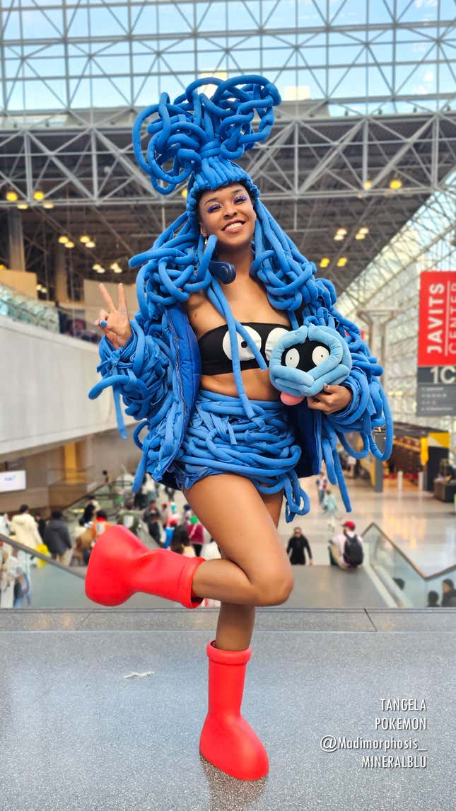 A cosplayer dresses as a femme humanoid version of Tangela at Anime NYC 2023.