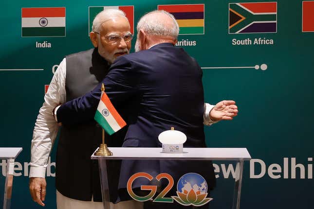 Indian Prime Minister Narendra Modi, left, hugs Brazilian President Luiz Inacio Lula da Silva as they attend the launch of the Global Biofuels Alliance at the G20 summit in New Delhi, India, Saturday, Sept. 9, 2023. (AP Photo/Evelyn Hockstein, Pool)