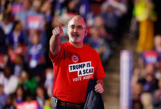 United Auto Workers President Shawn Fain speaks onstage during the Democratic National Convention on August 19.