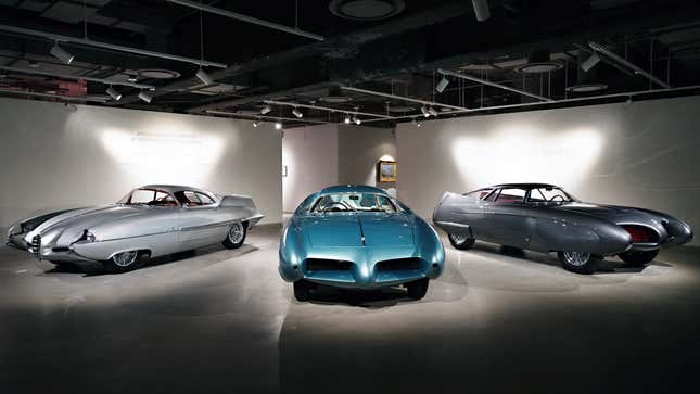 A photo of three BAT cars from Alfa Romeo. 