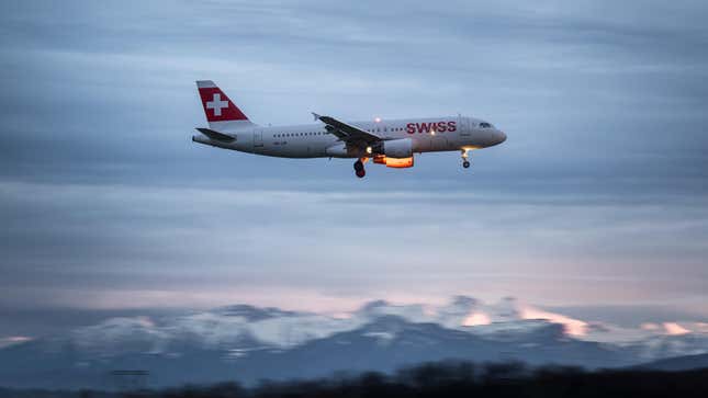 A plane arrives at Geneva International Airport