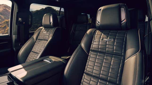 A photo of the front seats in the Cadillac Escalade. 