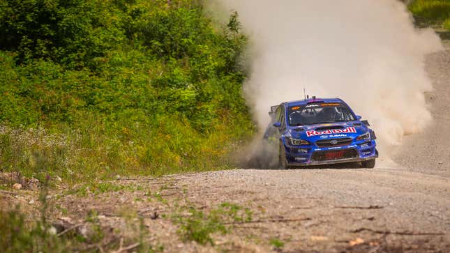 A photo of a Subaru rally car racing in New England. 