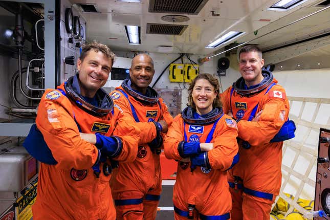 Artemis 2 NASA astronauts (left to right) Reid Wiseman, Victor Glover, and Christina Koch, and CSA (Canadian Space Agency) astronaut Jeremy Hansen.