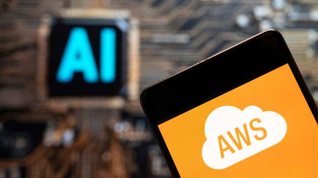 In this photo illustration, the American on-demand cloud computing platform owned by Amazon, Amazon Web Services (AWS) logo seen displayed on a smartphone with Artificial intelligence (AI) chip and symbol in the background. 