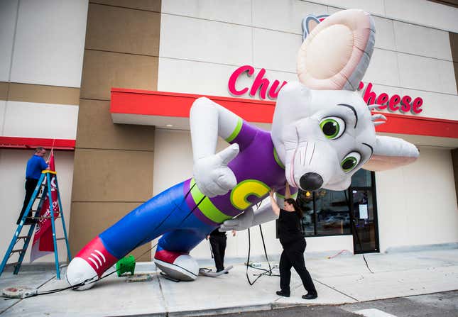 An inflatable Chuck E. Cheese mouse mascot in Houston, Texas. 