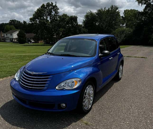 The front 3/4 shot of the electric blue PT Cruiser looks perfect