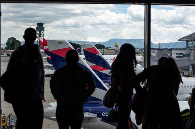 People wait for their departures at Bogota’s El Dorado International Airport in Colombia, July 28, 2023.