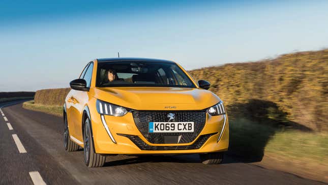 A photo of a yellow Peugeot 208 hatchback. 