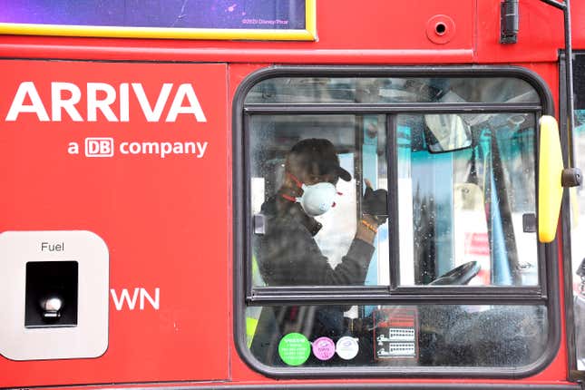 FILE - The logo of Arriva, the Deutsche Bahn&#39;s European public transport subsidiary, is seen on a bus as the driver, wearing a protective mask and gloves due to the Coronavirus outbreak, gives the thumbs up, in London, Sunday, March 29, 2020. Germany&#39;s state-owned railway operator, Deutsche Bahn, said Thursday, Oct. 19, 2023, that it has agreed to sell its European public transport subsidiary Arriva, to U.S.-based infrastructure investor I Squared Capital. (AP Photo/Alberto Pezzali, File)