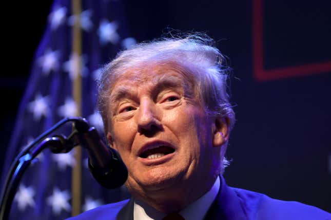 DAVENPORT, IOWA - MARCH 13: Former President Donald Trump speaks to guests gathered for an event at the Adler Theatre