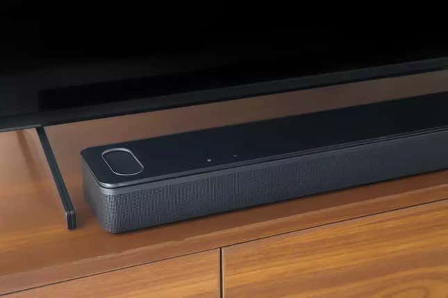 The Bose Smart Soundbar 900 sitting on a TV stand