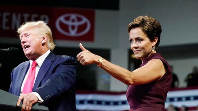 Arizona Republican candidate for governor Kari Lake and former President Donald Trump in July.