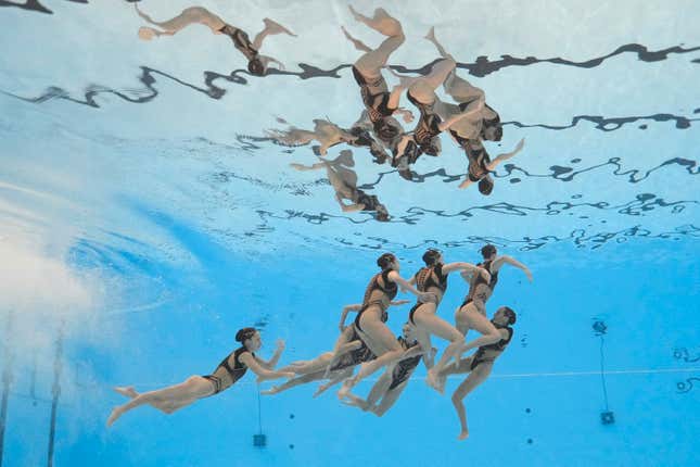 Spain team compete in the mixed team acrobatic of artistic swimming at the World Aquatics Championships in Doha, Qatar, Saturday, Feb. 3, 2024. (AP Photo/Lee Jin-man)