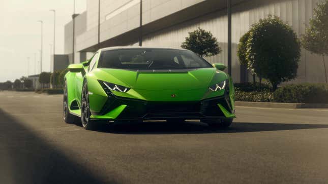 A green Lamborghini Huracan on a factory road