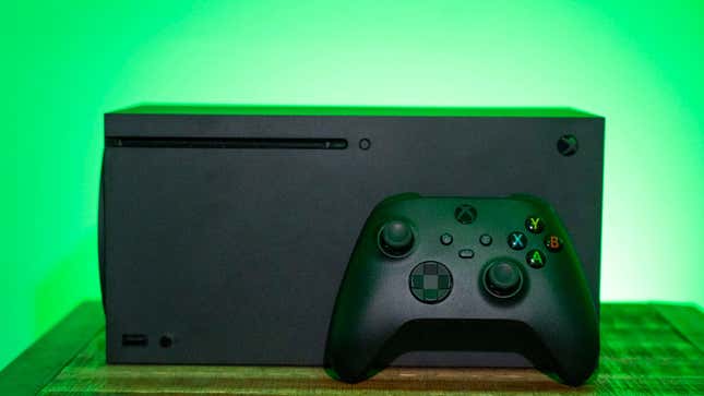 An Xbox Series X console and controller on a green background.