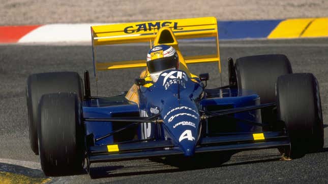 A photo of the blue and yellow Tyrrell Formula 1 car. 