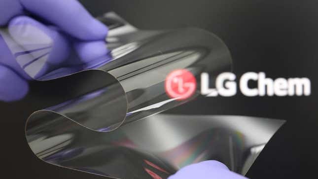 A photo of a foldable piece of plastic against the LG Chem logo