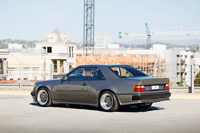 Rear 3/4 view of a grey Mercedes-Benz AMG 300CE 6.0 Hammer