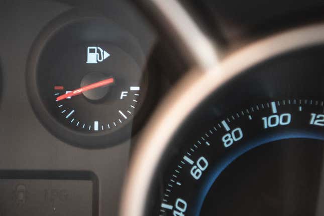 A photo of a cars gas gauge showing empty