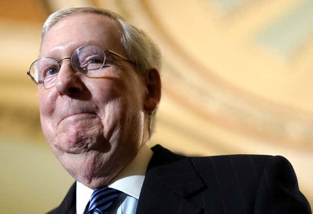 Mitch McConnell looking like a sneaky fart.