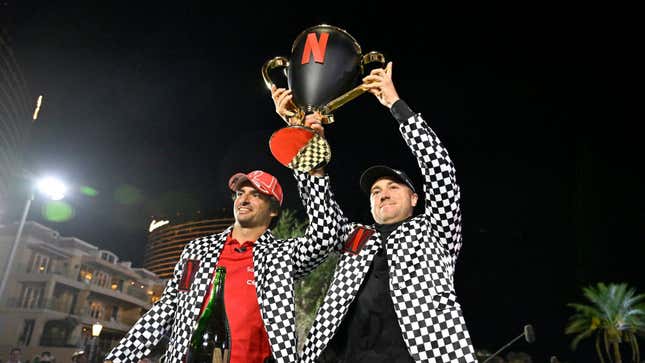 Formula 1 driver Carlos Sainz and PGA Tour pro Justin Thomas celebrate their victory in The Netflix Cup.