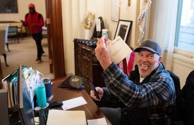 Image for article titled Federal Judge Reverses Arkansas Judge&#39;s Ruling to Set Free the &#39;Entitled&#39; Asshole Who Sat at Nancy Pelosi&#39;s Desk During Capitol Riot