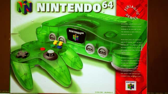 A green N64 sits in a box. 