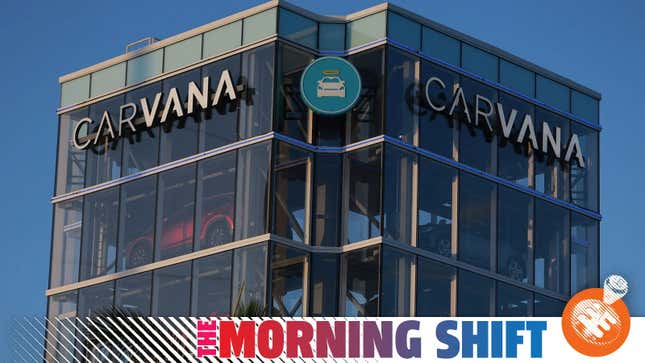 A photo of the Carvana glass tower of cars with The Morning Shift banner along the bottom. 