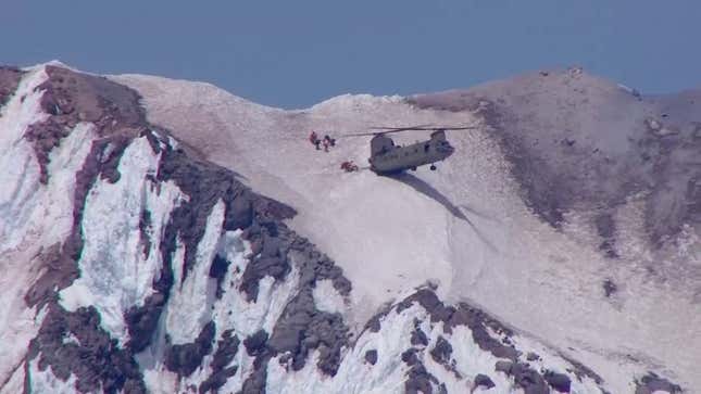 Daring Mountain Rescue Features Helicopter Parking Its Butt Right On The Snow