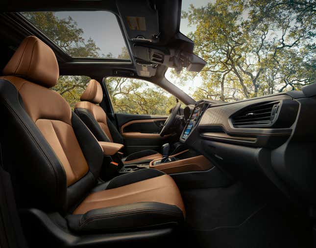 The interior of the new Forester with brown and black seats 