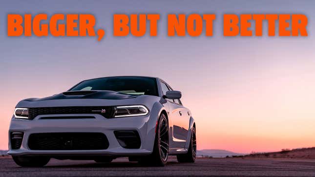 A photo of a Dodge Charger at sunset. 