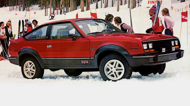 A photo of a red AMC Eagle parked on snow. 