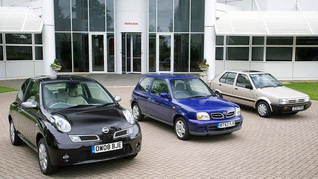 Three different Nissan Micra cars in black, blue and silver