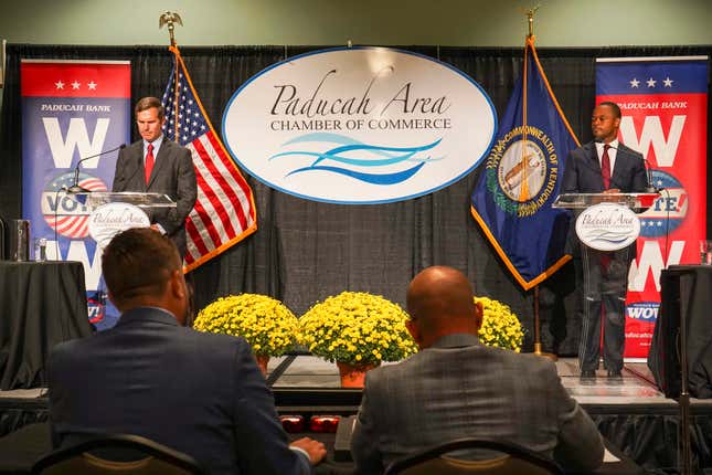 Kentucky Democratic Gov. Andy Beshear, left, stands on stage during a debate against Republican gubernatorial candidate and state Attorney General Daniel Cameron, Thursday, Oct. 12, 2023, in Paducah, Ky. (Charity Blanton/The Paducah Sun via AP)