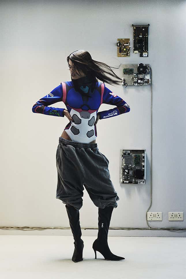 A model wears a D.Va inspired long-sleeved bodysuit under slouchy sweatpants.