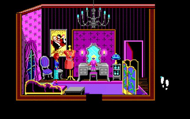 Nancy stands in a wonderfully colorful boudoir, while another woman sits at a vanity. 