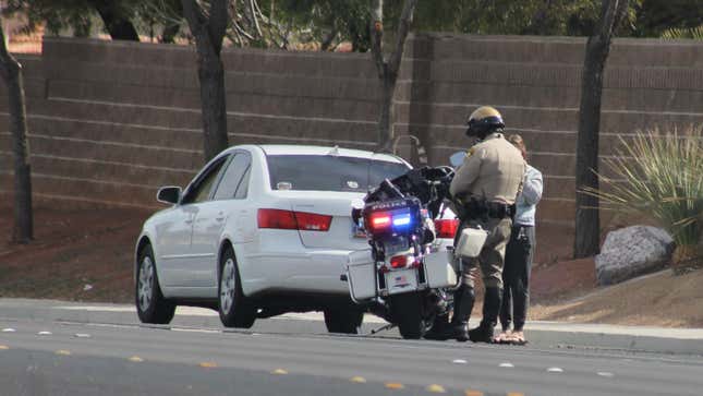 Image for article titled Why Cops Tap Your Car’s Tail Lights During A Traffic Stop