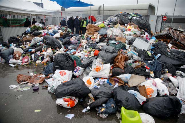 Members of the CGT union block access to a waste treatment center near Paris.