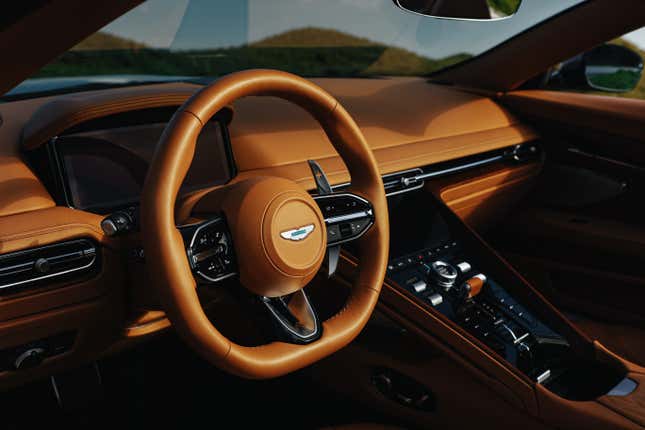 Dashboard of a brown Aston Martin DB12 Volante
