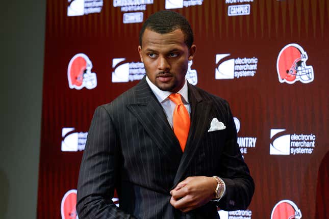 Cleveland Browns quarterback Deshaun Watson enters a news conference at the NFL football team’s training facility, on March 25, 2022, in Berea, Ohio. The NFL suspended Watson for six games on Monday, Aug. 1, 2022 for violating its personal conduct policy following accusations of sexual misconduct made against him by two dozen women in Texas, two people familiar with the decision said.