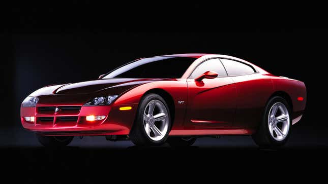 A photo of the red 1999 Dodge Charger concept in a studio. 