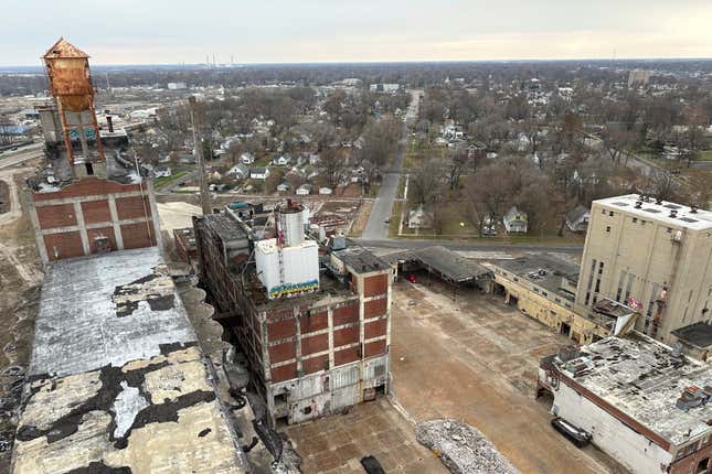 The view from high in the head house of the former Pillsbury Mills plant in Springfield, Ill., Nov. 30, 2023, shows the vast expanse of vacant factory that the nonprofit organization Moving Pillsbury Forward has pledged to demolish followed by redevelopment of the site. The organization needs approval from the Federal Aviation Authority, among other federal agencies, to raze the site because the head house, the city&#39;s third-largest structure, encroaches by several feet into airspace of Abraham Lincoln Capital Airport. (AP Photo/John O&#39;Connor)