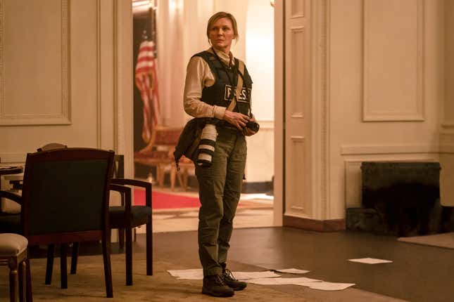 This image released by A24 shows Kirsten Dunst in a scene from &quot;Civil War.&quot; (Murray Close/A24 via AP)