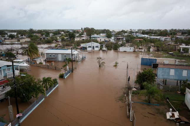 Streets are flooded on Salinas Beach after the passing of Hurricane Fiona in Salinas, Puerto Rico, Monday, Sept. 19, 2022. 