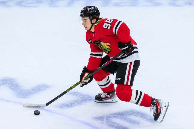 Nov 19, 2023; Chicago, Illinois, USA; Chicago Blackhawks center Connor Bedard (98) skates with the puck against the Buffalo Sabres during the third period at the United Center.
