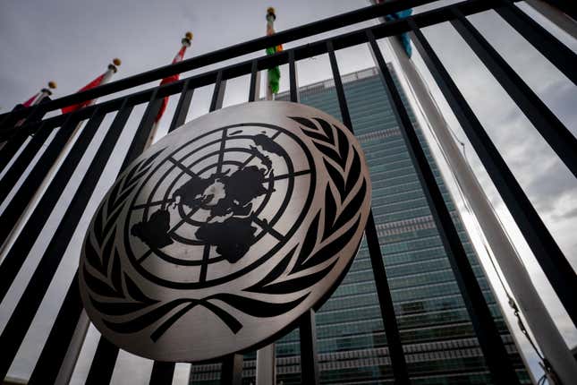 FILE - The symbol of the United Nations is displayed on the main gate outside UN headquarters, Feb. 24, 2022, in New York. The United States is spearheading the first United Nations resolution on artificial intelligence, aimed at ensuring the new technology is “safe, secure and trustworthy” and that all countries, especially those in the developing world, have equal access. The draft General Assembly resolution aims to close the digital divide between countries and make sure they are all at the table in discussions on AI. (AP Photo/John Minchillo, file)