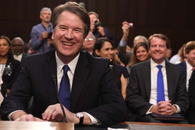 US Supreme Court nominee Brett Kavanaugh arrives on the first day of his confirmation hearing in front of the US Senate on Capitol Hill in Washington DC, on September 4, 2018. - President Donald Trump's newest Supreme Court nominee Brett Kavanaugh is expected to face punishing questioning from Democrats this week over his endorsement of presidential immunity and his opposition to abortion. Some two dozen witnesses are lined up to argue for and against confirming Kavanaugh, who could swing the nine-member high court decidedly in conservatives' favor for years to come. Democrats have mobilized heavily to prevent his approval. (Photo by SAUL LOEB / AFP) (Photo credit should read SAUL LOEB/AFP via Getty Images)